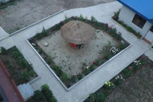 A garden outside Hotel Nepal Inn Sauraha- Relax and refresh - A perfect family getaway