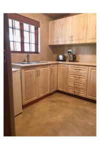 A kitchen or kitchenette at Blue Mountain View Cottages