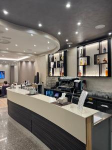 TV a/nebo společenská místnost v ubytování Hotel Vittoria