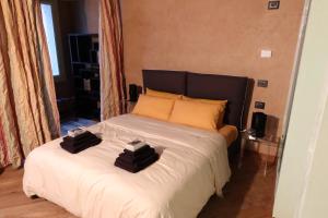 En eller flere senger på et rom på Verona Luxury Flats Piazza Erbe, floor 3