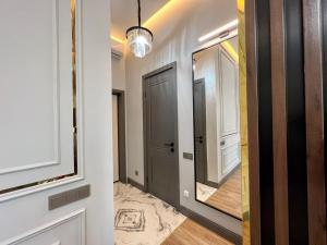 Ένα μπάνιο στο Стильные апартаменты в элитном комплексе