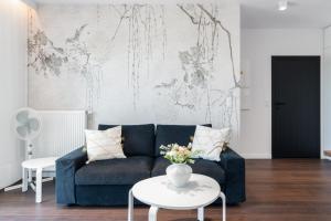 Posedenie v ubytovaní Stylish & Comfy Garbary Apartments with Parking by Noclegi Renters