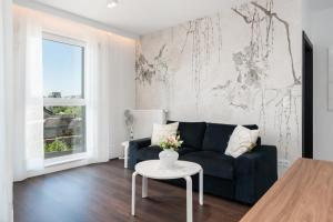 Posedenie v ubytovaní Stylish & Comfy Garbary Apartments with Parking by Noclegi Renters