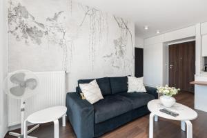 Posedenie v ubytovaní Stylish & Comfy Garbary Apartments with Parking by Noclegi Renters