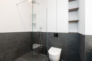 Kúpeľňa v ubytovaní Stylish & Comfy Garbary Apartments with Parking by Noclegi Renters