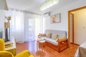 Telewizja i/lub zestaw kina domowego w obiekcie Inftour Apolo Apartamento