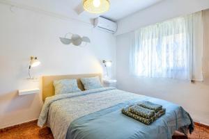 Łóżko lub łóżka w pokoju w obiekcie Inftour Apolo Apartamento