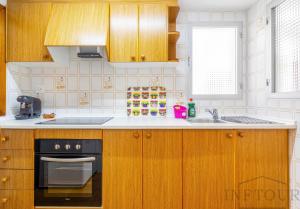 Kuchnia lub aneks kuchenny w obiekcie Inftour Apolo Apartamento