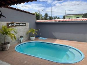 Casas Peroba Maragogi内部或周边的泳池