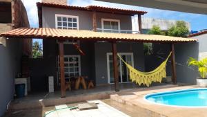 Casas Peroba Maragogi内部或周边的泳池