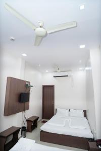 Postel nebo postele na pokoji v ubytování Sonar Bangla Guest House