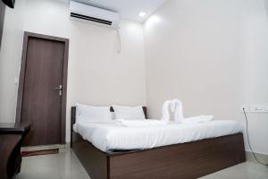 Postel nebo postele na pokoji v ubytování Sonar Bangla Guest House