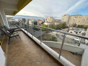 a balcony with a view of a city at Downtown "Rendez-Vous" Luxury in Bacău