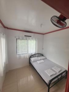 Postel nebo postele na pokoji v ubytování Rotunda Inn home stay