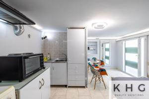 Kuchyň nebo kuchyňský kout v ubytování Little Studio in Argostoli (semi ground floor level)
