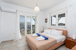 Postel nebo postele na pokoji v ubytování Hermione Villa + 26 fotografií