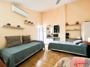 Postel nebo postele na pokoji v ubytování La Casona