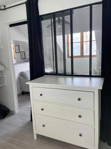 Posteľ alebo postele v izbe v ubytovaní Magnifique logement au pied du Château