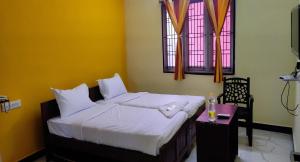 Afbeelding uit fotogalerij van PPH Living Lakshmi Palace in Tallākulam