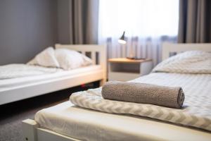 Posteľ alebo postele v izbe v ubytovaní Moon Hostel Wrocław