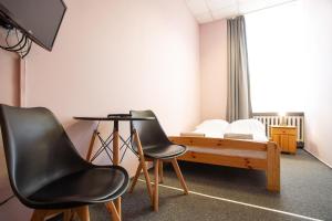 Televiisor ja/või meelelahutuskeskus majutusasutuses Moon Hostel Wrocław