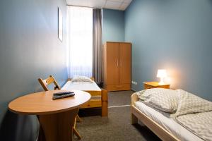 Posteľ alebo postele v izbe v ubytovaní Moon Hostel Wrocław