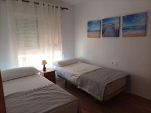 Postel nebo postele na pokoji v ubytování Chalet Cabo Palos