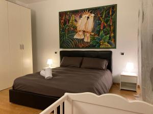 Postel nebo postele na pokoji v ubytování Giovigemini Apartment