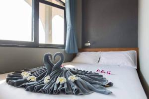 Postel nebo postele na pokoji v ubytování Leisure Hostel