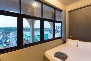 Postel nebo postele na pokoji v ubytování Leisure Hostel