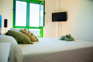 Katil atau katil-katil dalam bilik di Sea&Beach Arrecife