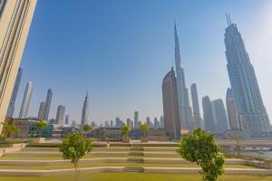 a view of a city skyline with tall buildings at BellaVista Chic 2 BR Downtown View II T1 - Burj Khalifa View in Dubai