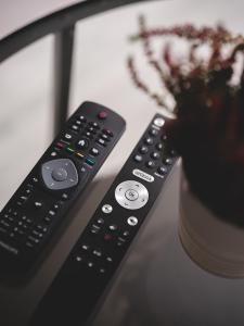 TV a/nebo společenská místnost v ubytování Trolltunga Aparthotel