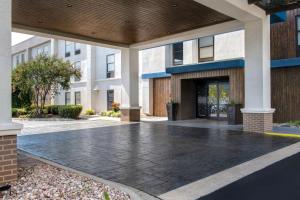 an empty courtyard in a building with at Hampton Inn Charlotte Monroe in Monroe