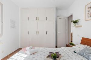 Łóżko lub łóżka w pokoju w obiekcie Villa Salada - PlusHolidays