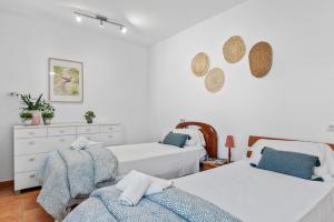 Łóżko lub łóżka w pokoju w obiekcie Villa Salada - PlusHolidays