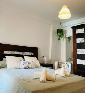 Katil atau katil-katil dalam bilik di Apartamento en Vera Playa Laguna Beach +18 gambar