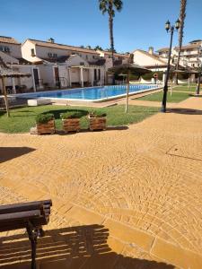 The swimming pool at or close to Aldeas De Aguamarina Phase I