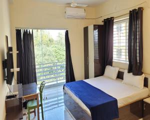 Hotel Soft Petal客房内的一张或多张床位