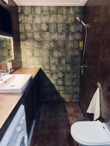 Kúpeľňa v ubytovaní BagriWood Lodges (Лоджі БагріВуд)