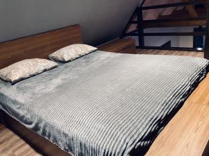 Posteľ alebo postele v izbe v ubytovaní BagriWood Lodges (Лоджі БагріВуд)