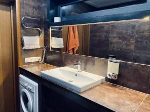 Kúpeľňa v ubytovaní BagriWood Lodges (Лоджі БагріВуд)