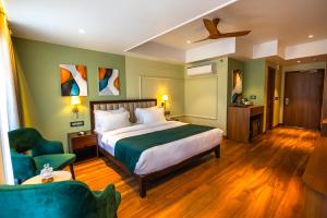 Postel nebo postele na pokoji v ubytování Clarks Inn Express, Rishikesh