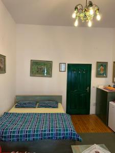 Letto o letti in una camera di Guesthouse Hurma Rooms