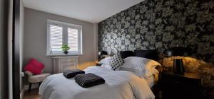 Una cama o camas en una habitación de Kings Sconce