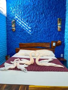 Katil atau katil-katil dalam bilik di Vila Alicia Flecheiras