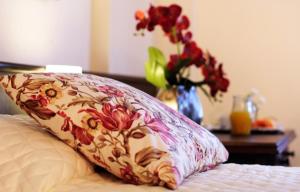 Cama ou camas em um quarto em Bogari Hotel