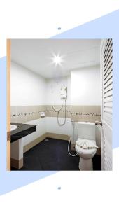 Koupelna v ubytování Mala Hotel
