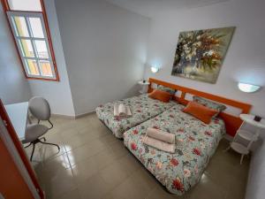Posteľ alebo postele v izbe v ubytovaní Casita Naranja - Bouganville