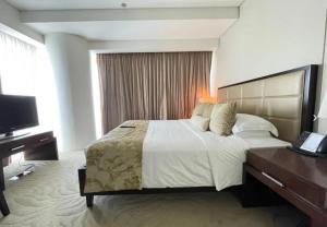 Una cama o camas en una habitación de Dubai Marina Studio - The UpperKey Collection